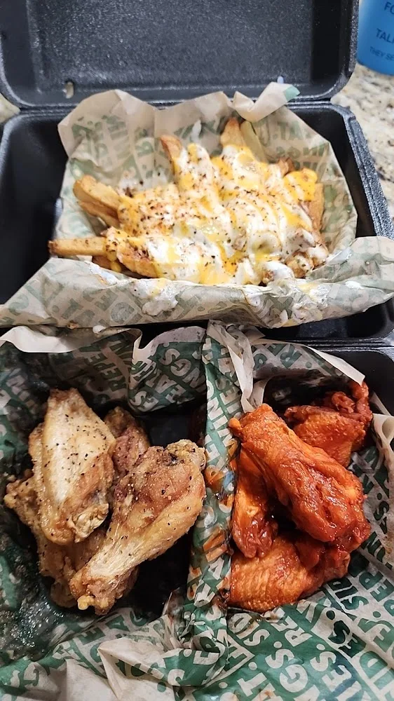 Wingstop food and storefront view at 2065 N. Harris Blvd in Layton, Utah