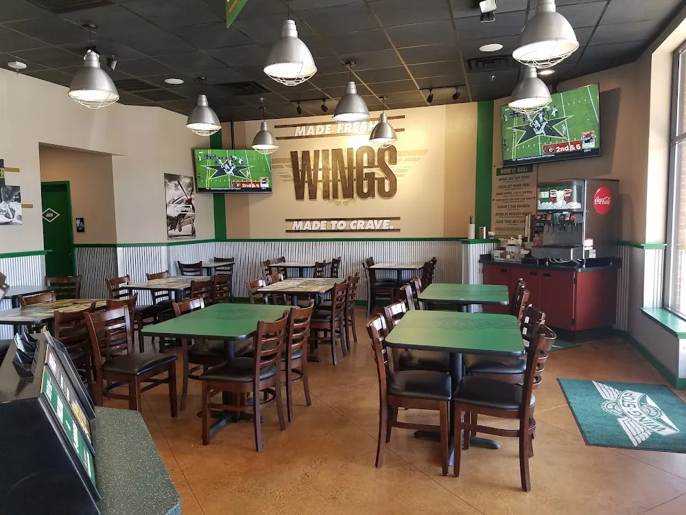Wingstop food and storefront view at 14215-B Centreville Square in Centreville, Virginia