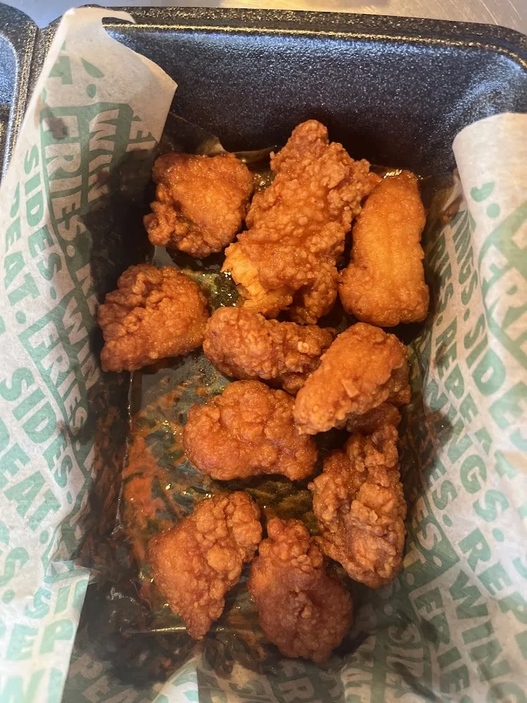 Wingstop food and storefront view at 10415 Bristow Center Dr in Bristow, Virginia