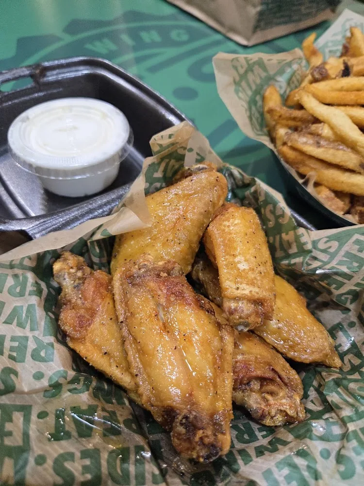Wingstop food and storefront view at 8805 Centreville Rd in Manassas, Virginia
