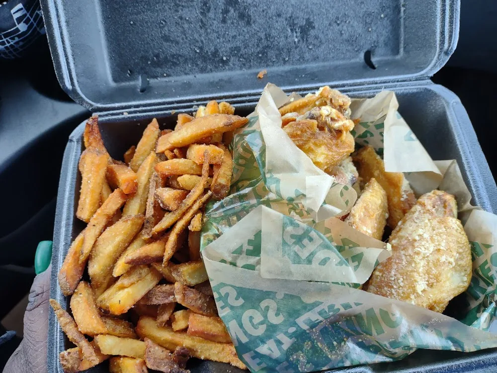 Wingstop food and storefront view at 12229 Jefferson Ave #700 in Newport News, Virginia