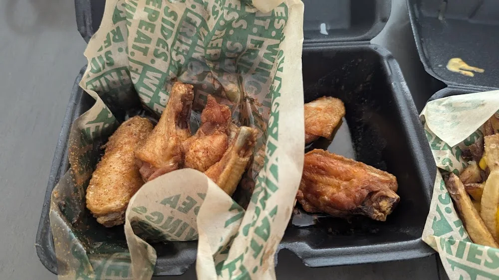 Wingstop food and storefront view at 15488 Warwick Blvd in Newport News, Virginia
