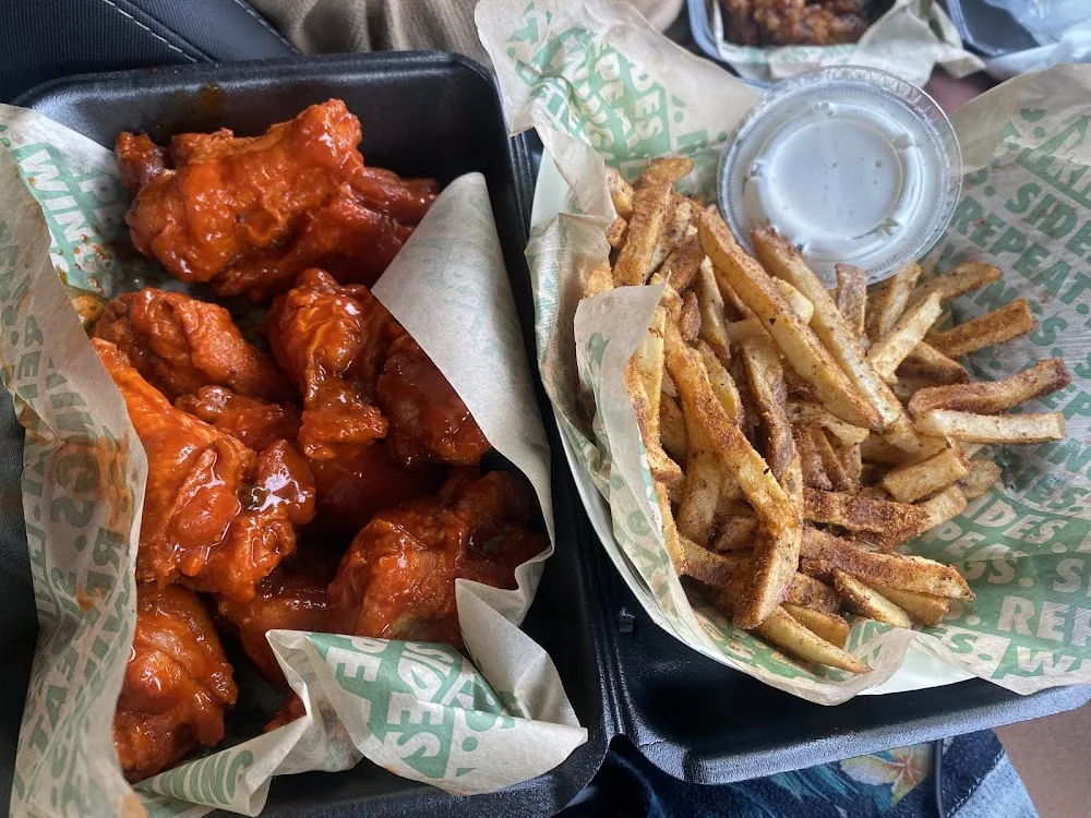 Wingstop food and storefront view at 4091 Concord Creek Place in Richmond, Virginia