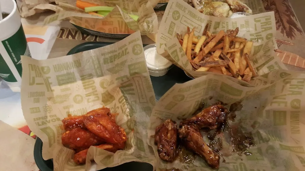 Wingstop food and storefront view at 21430 Cedar Dr Ste 108 in Sterling, Virginia
