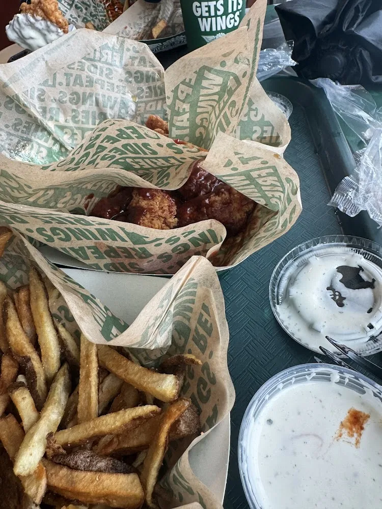 Wingstop food and storefront view at 1001 NE 67th St in Seattle, Washington