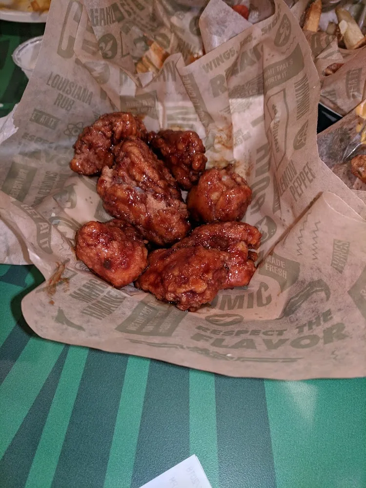 Wingstop food and storefront view at 305 SE Chkalov Drive in Vancouver, Washington