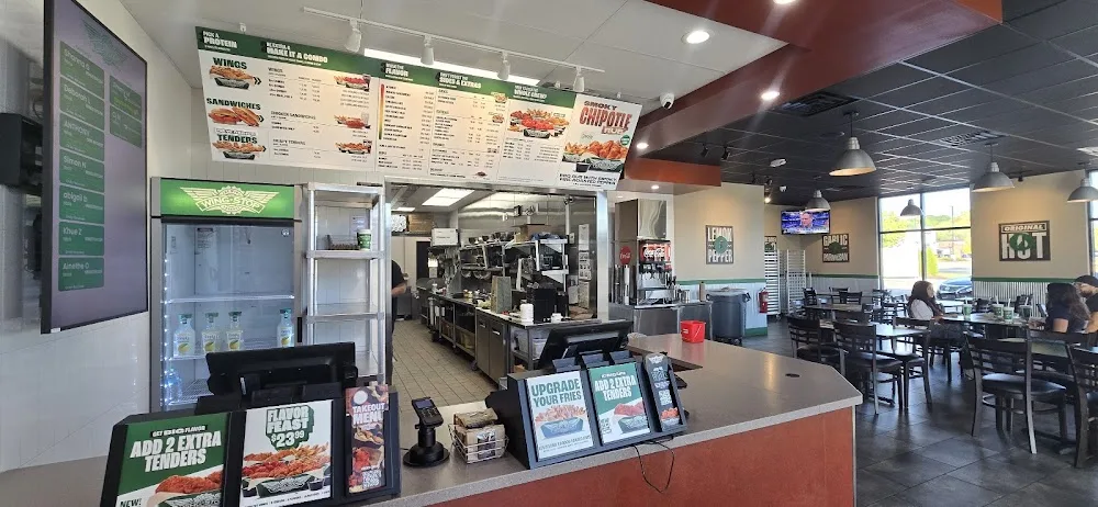 Wingstop food and storefront view at 2360 E. Mason St. in Green Bay, Wisconsin