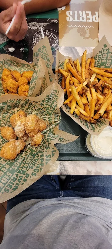 Wingstop food and storefront view at 2626 S. Oneida St in Green Bay, Wisconsin