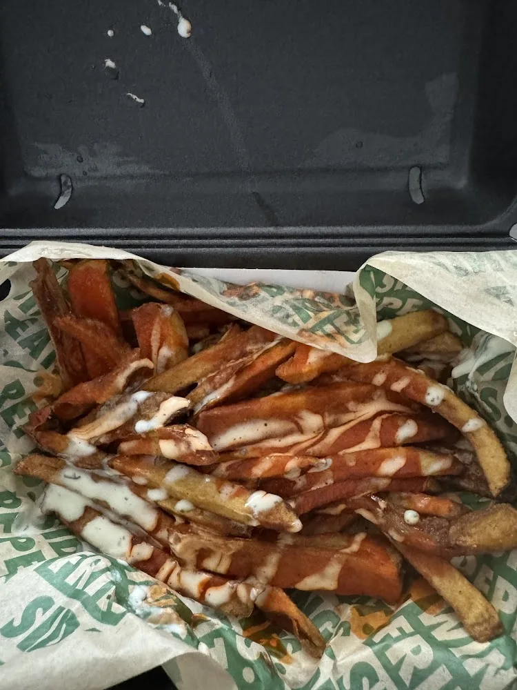 Wingstop food and storefront view at 733 North Milwaukee St in Milwaukee, Wisconsin