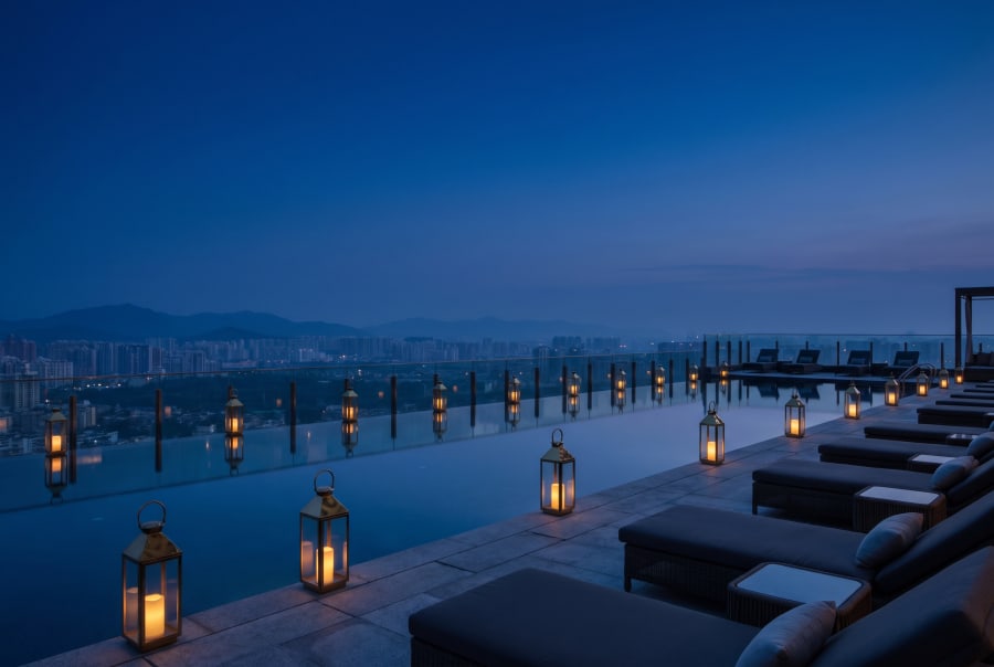 The rooftop pool at twilight.