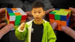Alt-Nuevos récords del mundo de Rubik 3x3x3: Yiheng Wang (de 8 años), mejor promedio, 3,84 s y Xuanyi Geng (7 años), cubo más rápido, 3,05