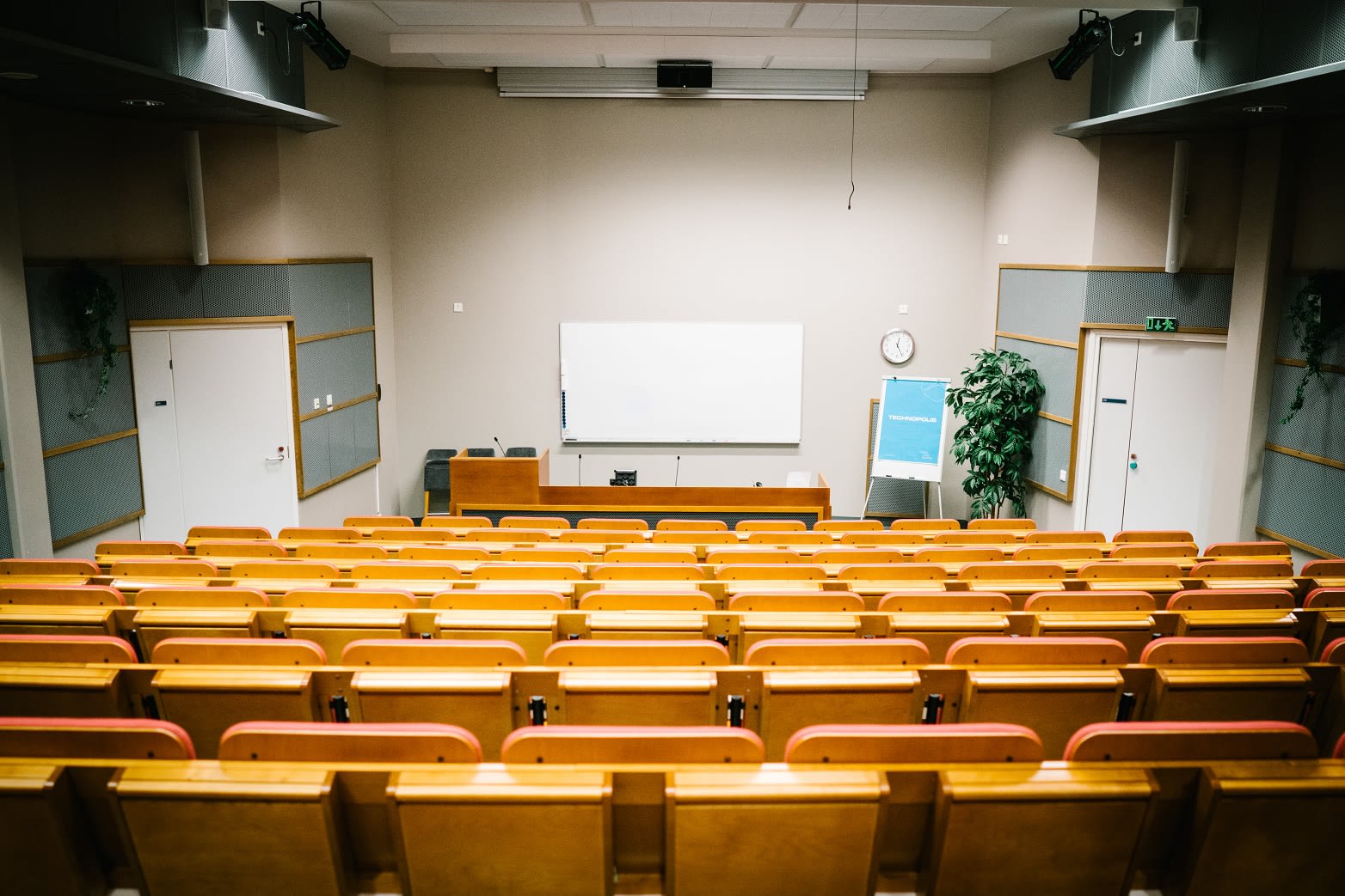 The auditorium in Elektroniikkatie 10 has the capacity of 120 persons. The room includes high speed Wi-Fi, a data projector or LCD-screen, audio and microphones and a flip chart or a whiteboard and materials for taking notes.