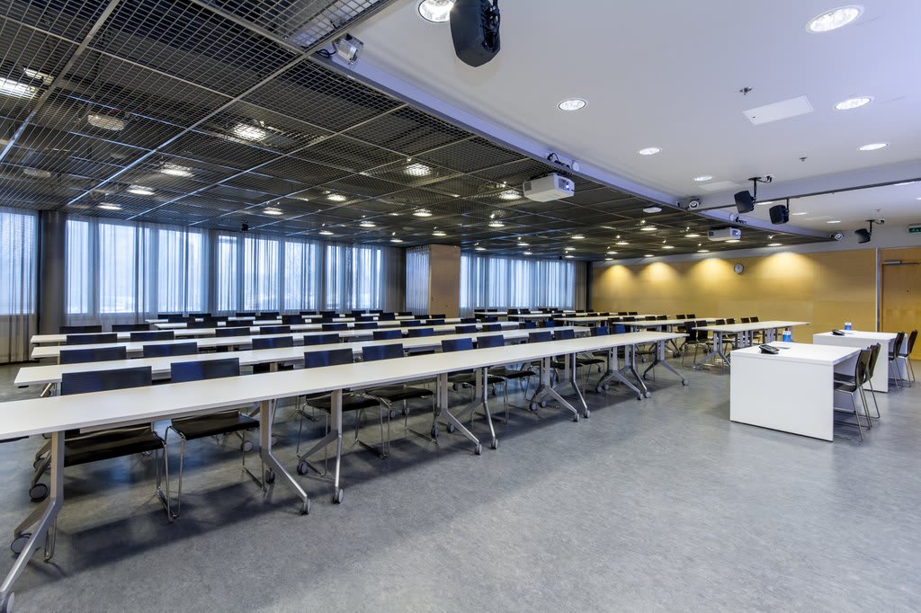 Seminar room located next to Aalto University along the Kehä I ring road, offering excellent traffic connections to all directions. It is possible to arrange the tables to a classroom (for 90 persons), diplomat or U-table (for 50 persons) mode or to set chair rows without tables (for 200 persons).