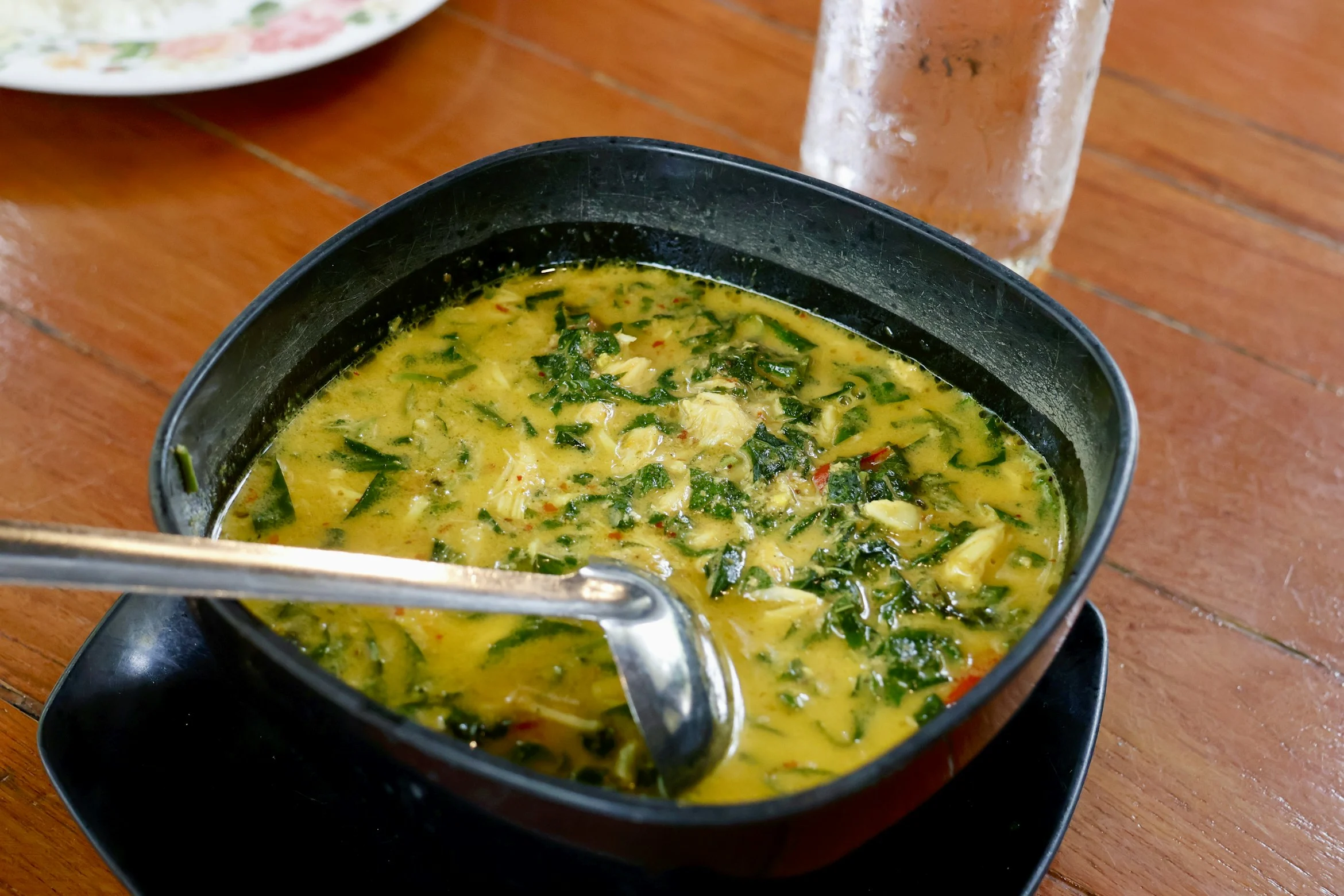 Thai curry soup with betel leaf and crab meat.
