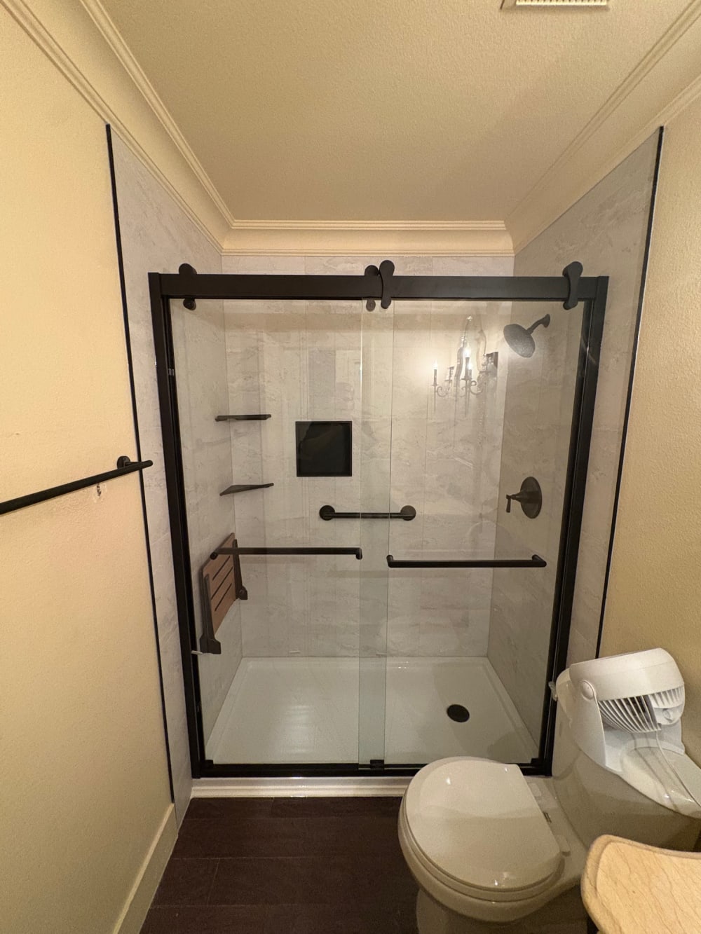 Modern walk-in shower with clean tile after Las Vegas bathroom remodel by EZ Bath & Shower