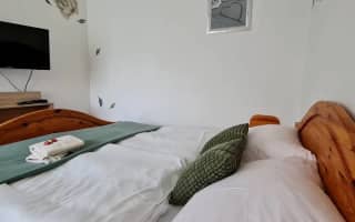 Lienka Ubytovanie - Trojlôžková izba s kúpeľňou - photo 3