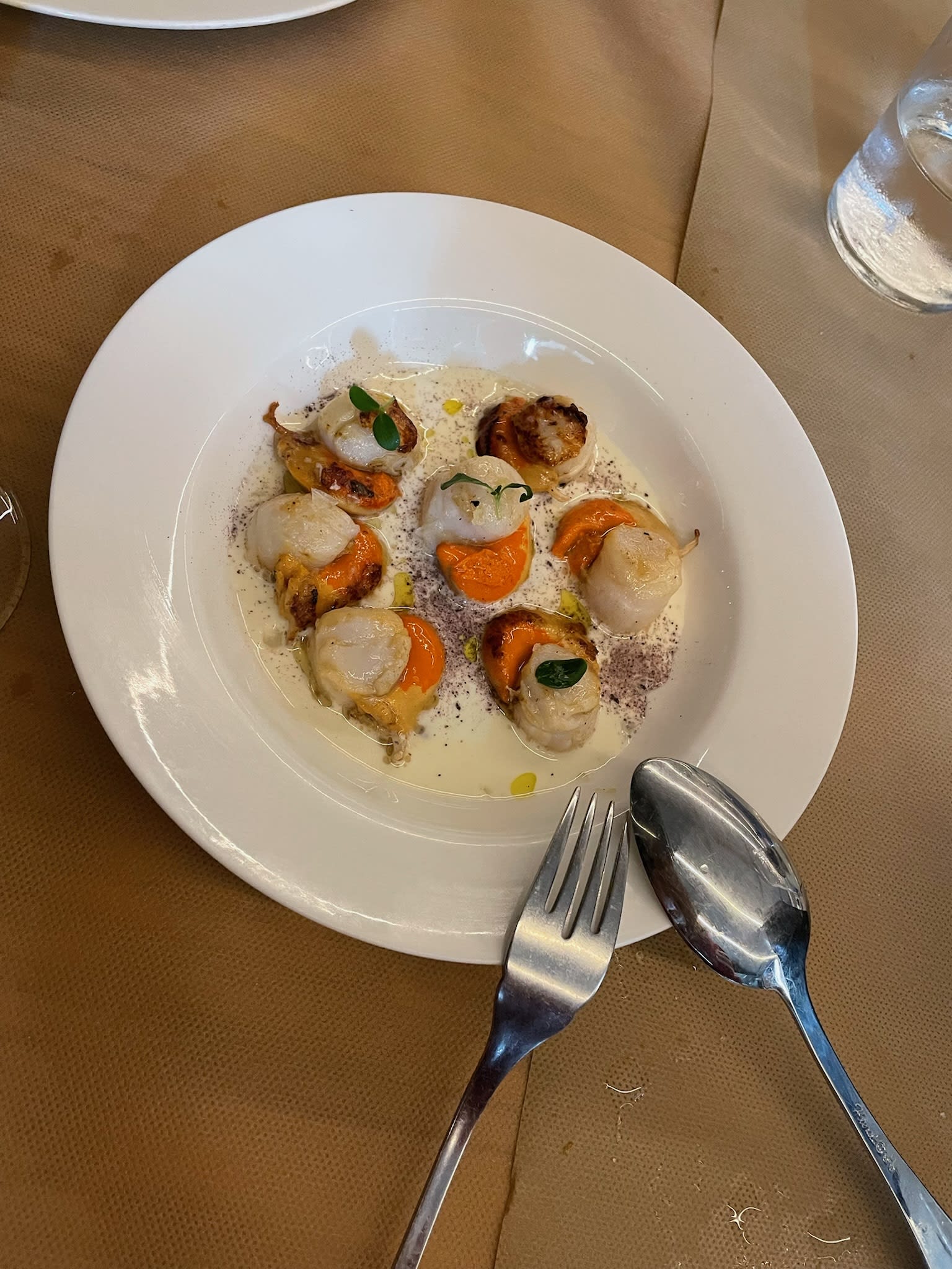 Zamburiñas met knoflook, olijfolie en peterselie