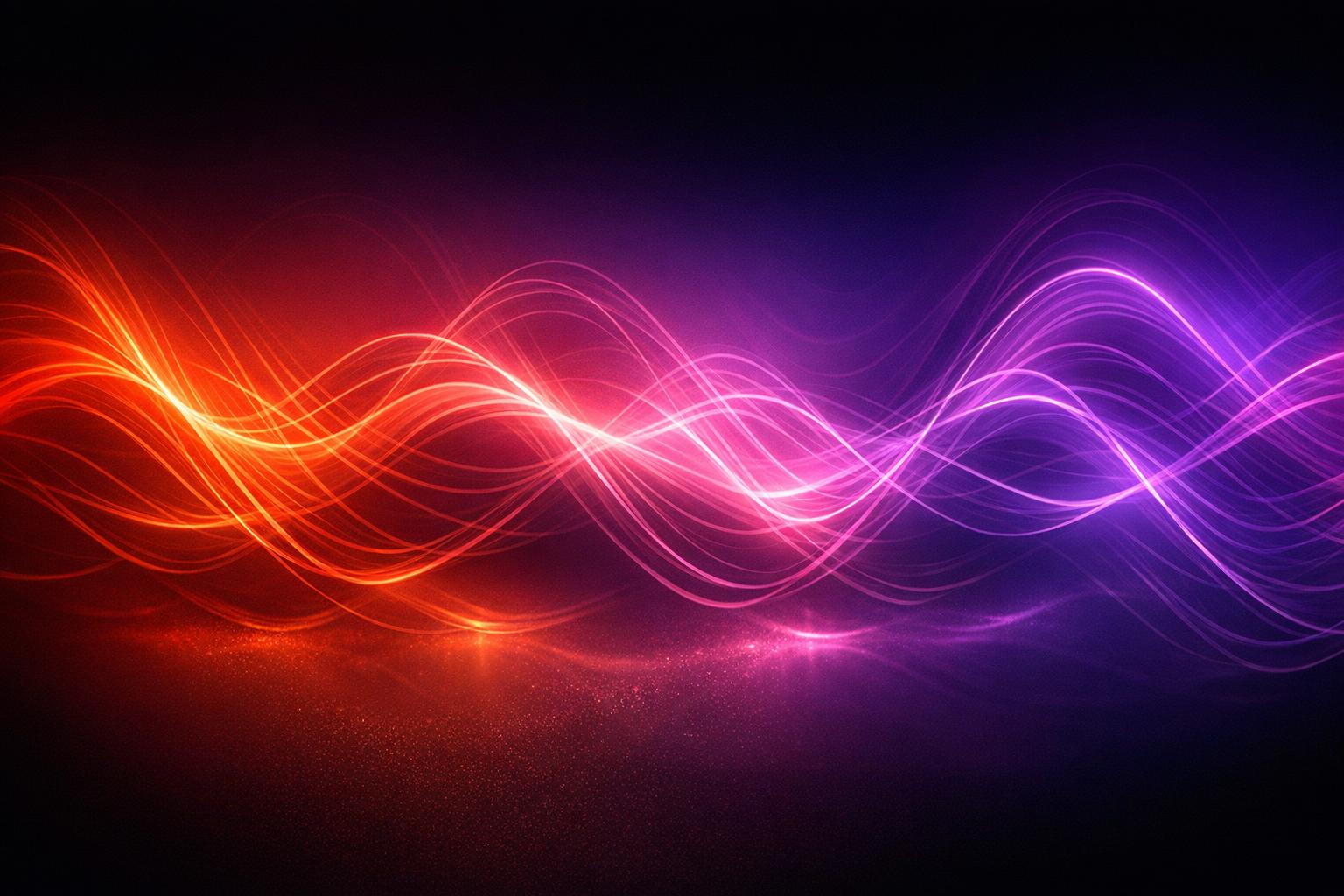 Abstract waves of energy in red and violet hues illustrating vibration as the foundation of physical reality
