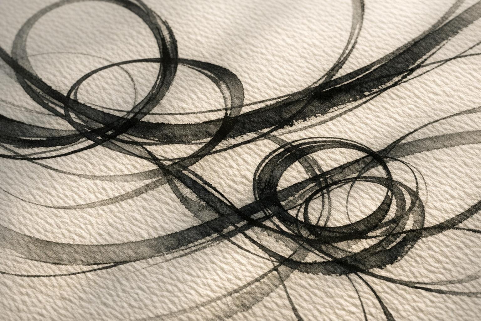Abstract close-up of ink strokes on paper showing varied loops and curves symbolizing emotional expression in handwriting
