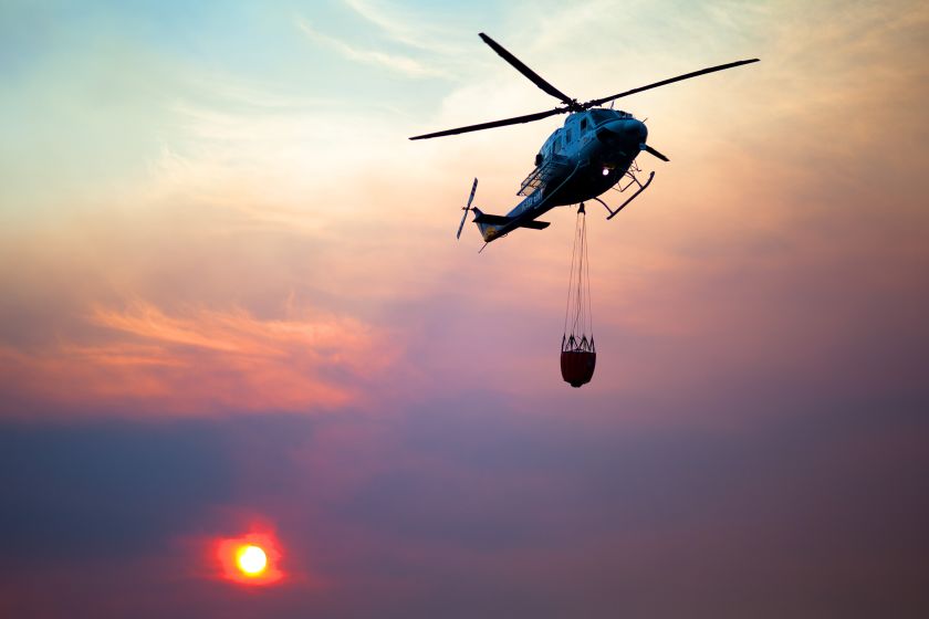 Helicopter putting out a fire