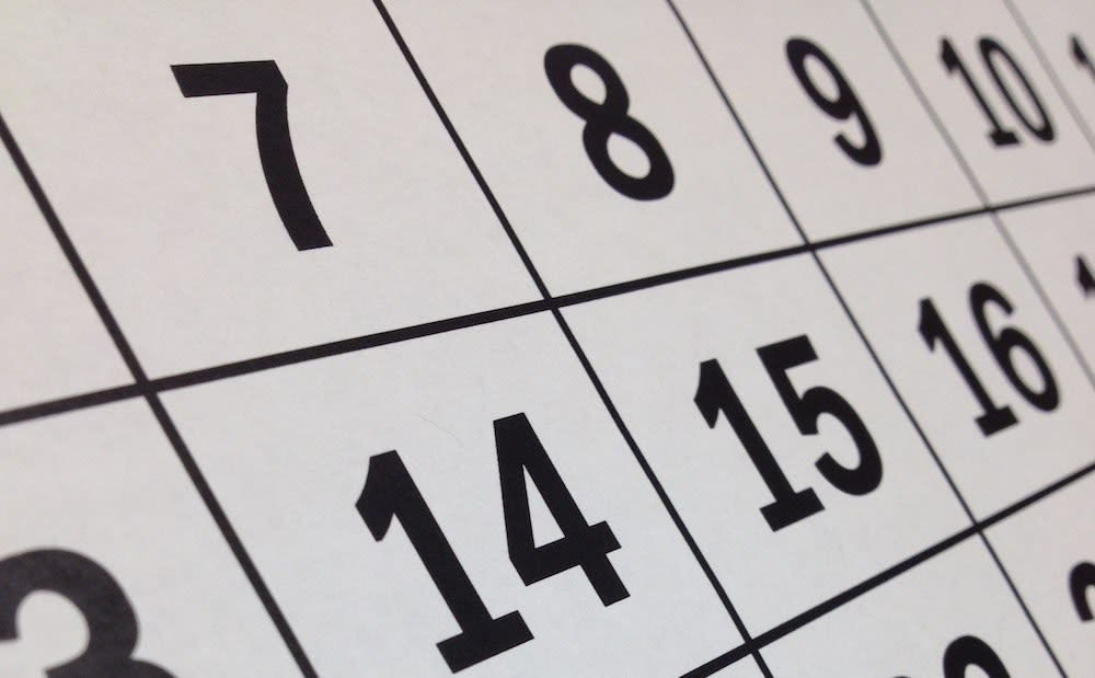 a close-up of a monochrome calendar showing dates