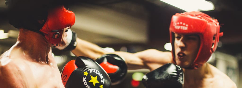 Boxers throwing punches