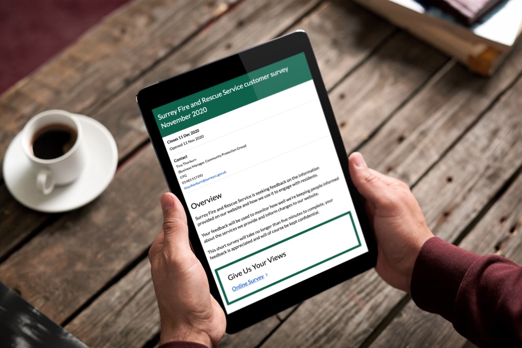 Image displaying Surrey's Fire and Rescue Service Customer Survey on an iPad. Image shows Citizen Space's reactive design.