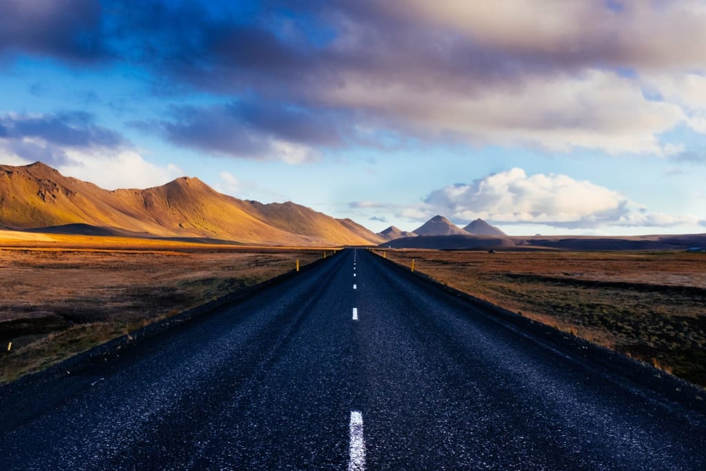 a picture of a long, straight road disappearing into the distance, which is a tenuous metaphor for a simple user journey