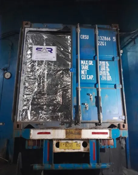 Container filled with charcoal boxes