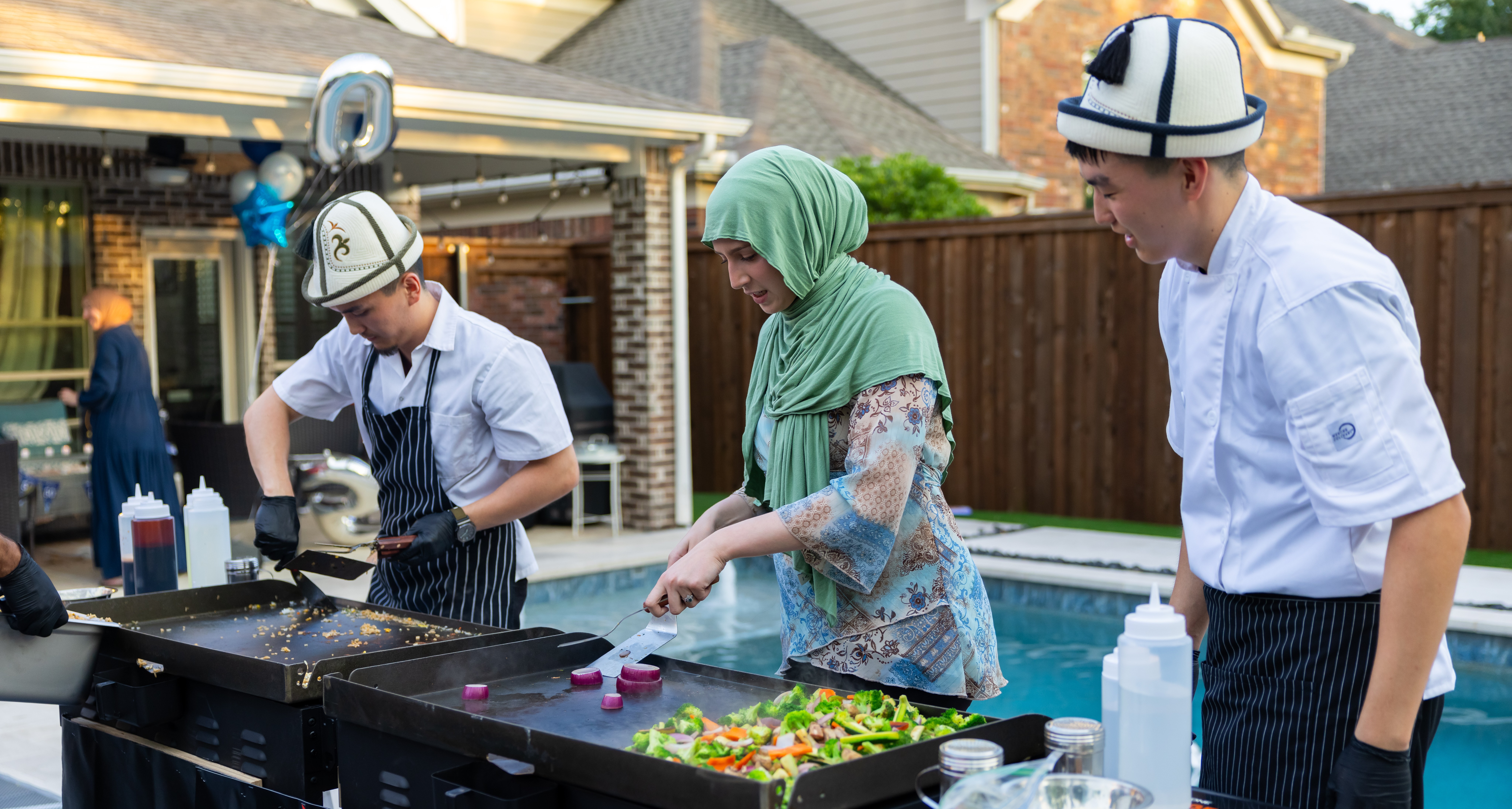 Master chef with traditional hibachi tools and equipment