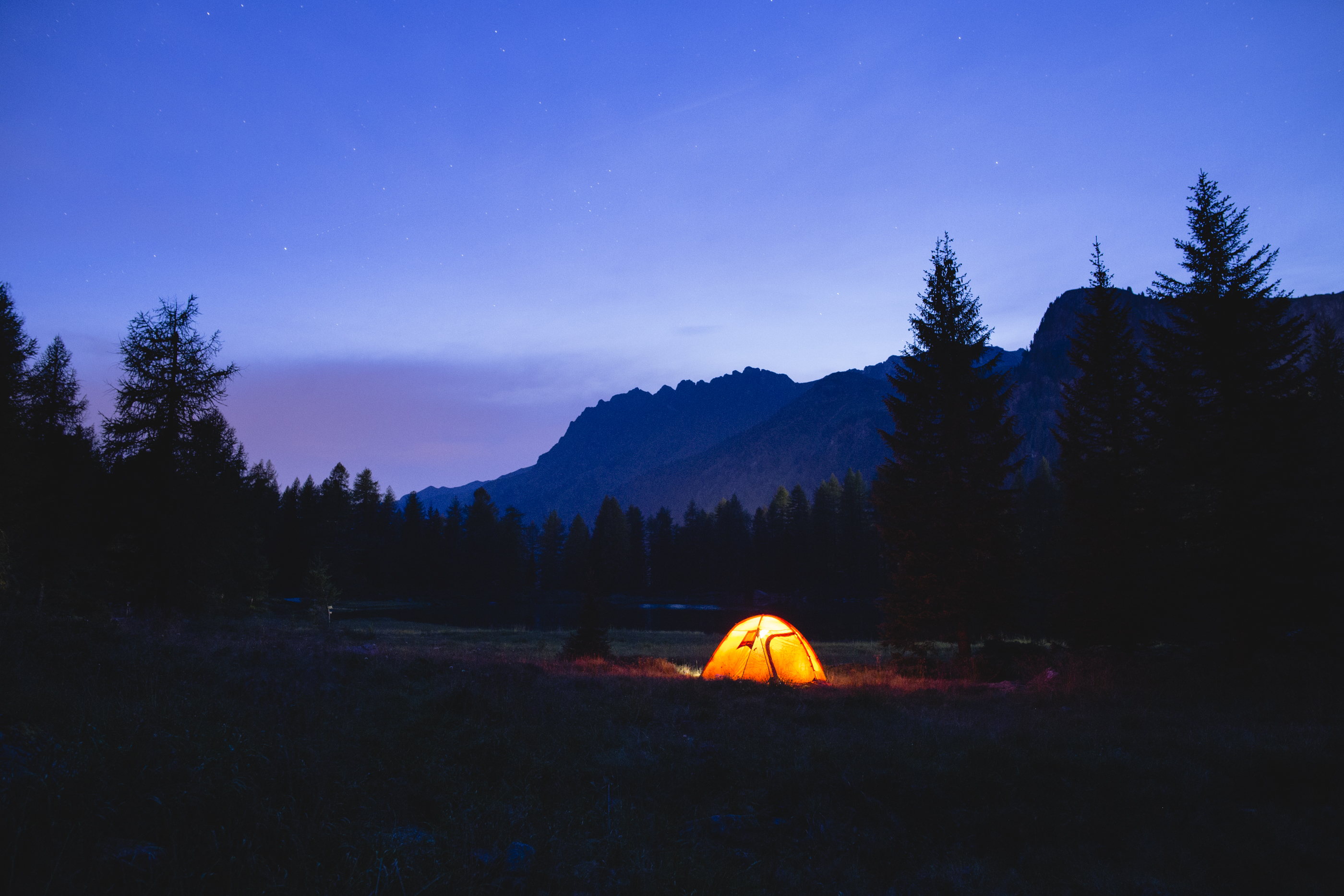 Night falls over a base camp