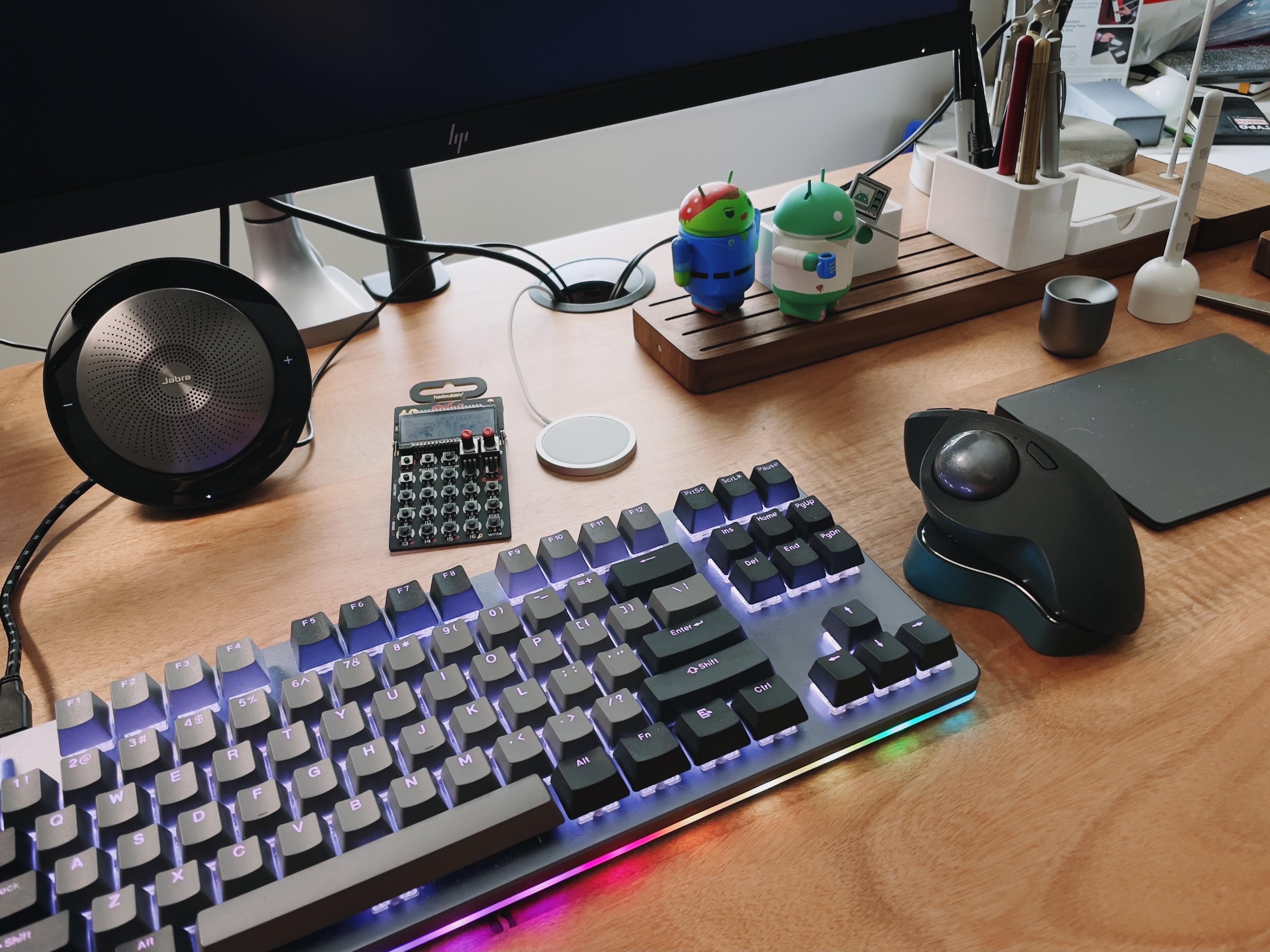 Jabra Speak 710, Drop CTRL Keyboard, Logitech MX Ergo, Gather desk organizer w/ Baron Fig pens Jabra Speak 710, Drop CTRL Keyboard, Logitech MX Ergo, Gather desk organizer w/ Baron Fig pens