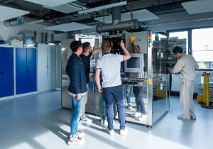 People working at machine