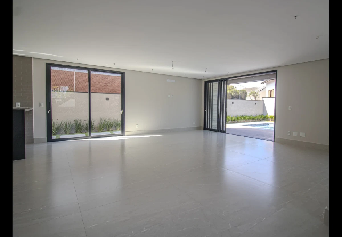 Elegância Contemporânea com 4 Suítes, Piscina e Espaço Gourmet no Alphaville Residencial 6 - foto 1