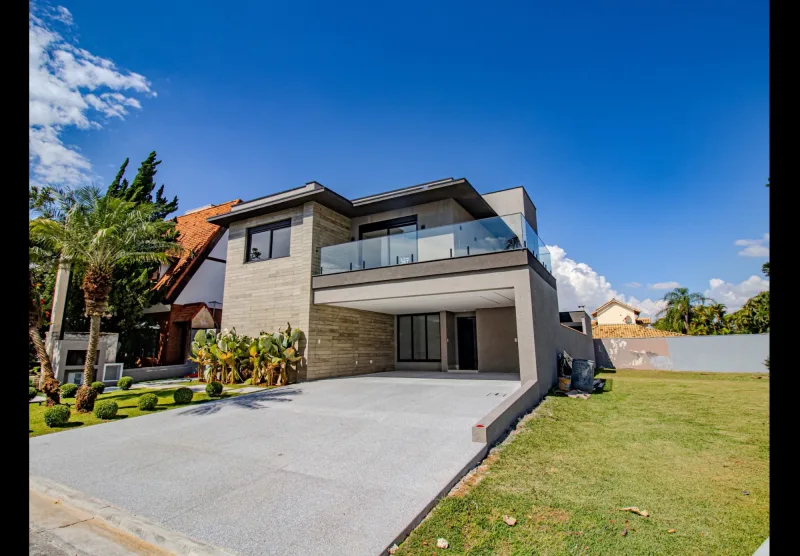 Elegância Contemporânea com 4 Suítes, Piscina e Espaço Gourmet no Alphaville Residencial 6 - foto 1