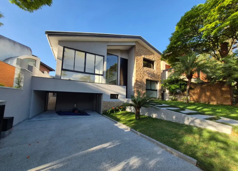 Casa de Alto Padrão com 3 Suítes, Ampla Área de Lazer e 4 Vagas - foto 1