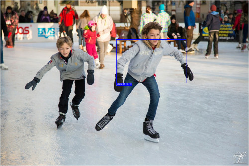 Ice-skating image with blue bounding-box overlaid on the jacket