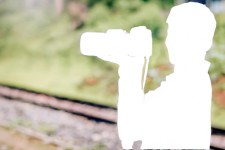 Isolated camera, straps and man, inverted