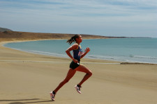 Background replaced with an empty beach