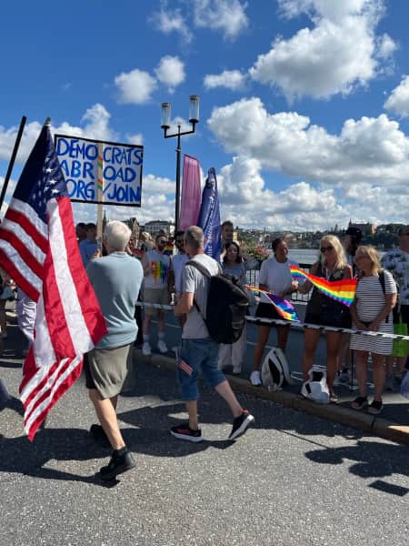 Members of Democrats Abroad Sweden marching in the Stockholm Pride parade