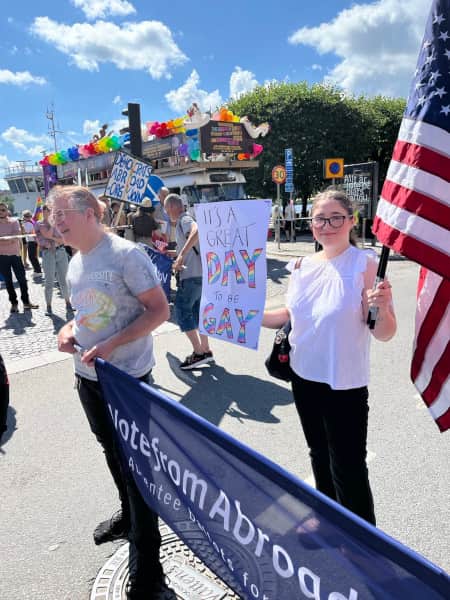 The Vote from Abroad banner and the US flag