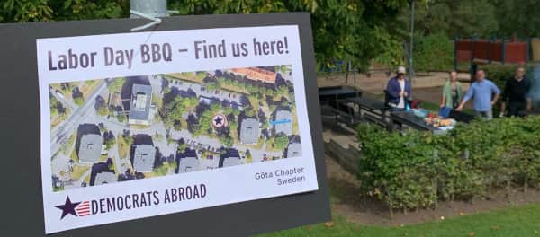 A sign identifies the group and welcomes people to join.