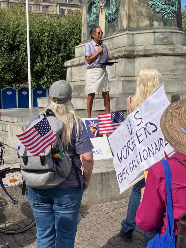 The speaker addresses the gathering at the monument in People's Park
