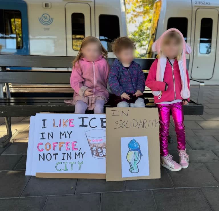 Three young protesters on their way to the demonstration