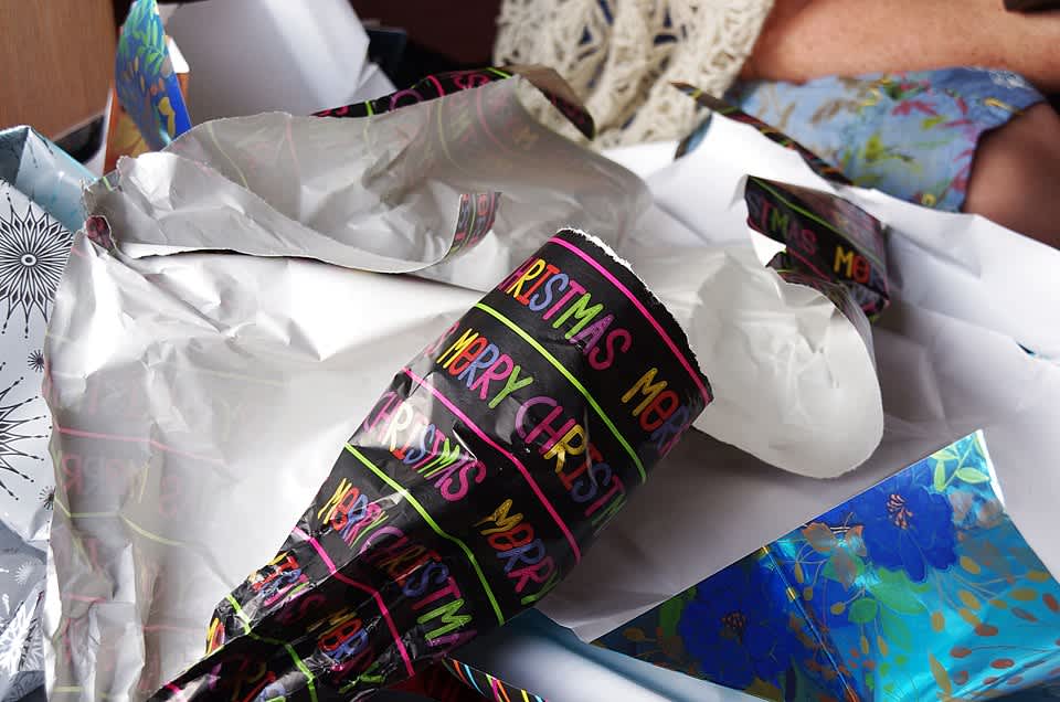 Discarded Christmas wrapping paper.
