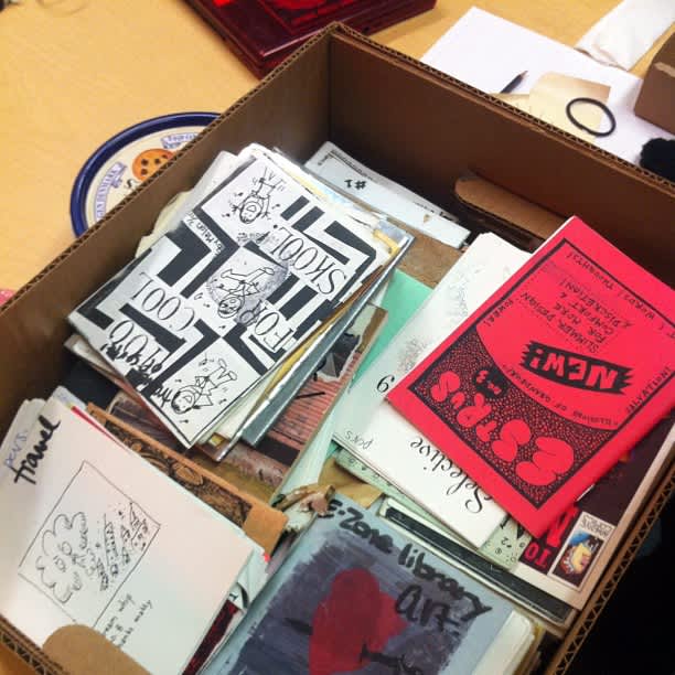 Artist zines on display.