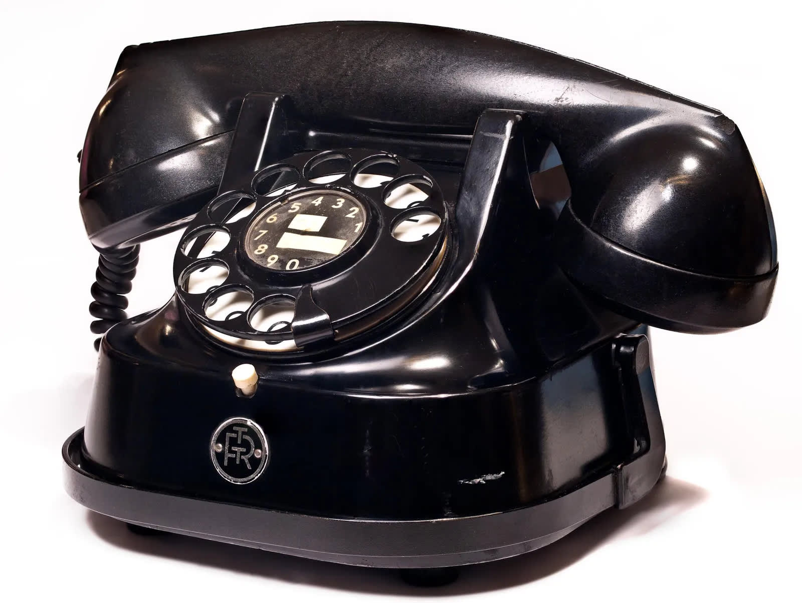 An old-fashioned rotary telephone.