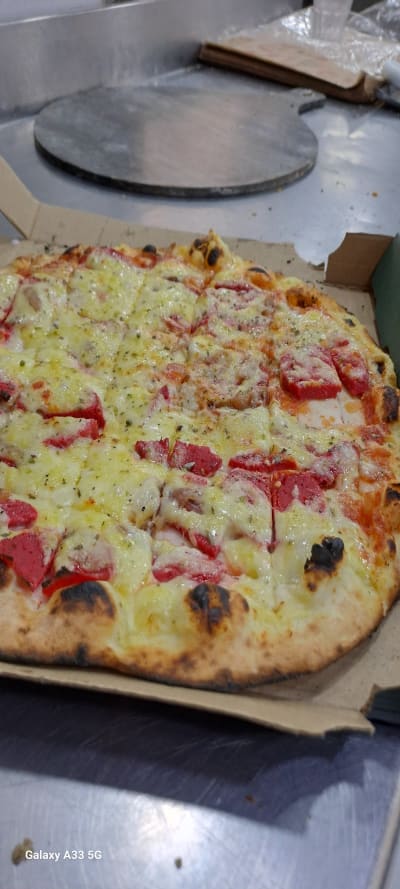 Pizza 500° au feu de bois