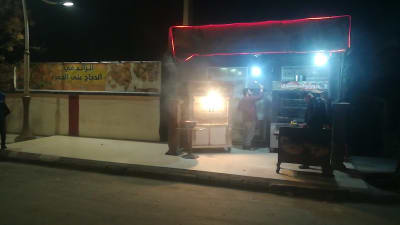 Poulets et lapins sur braise