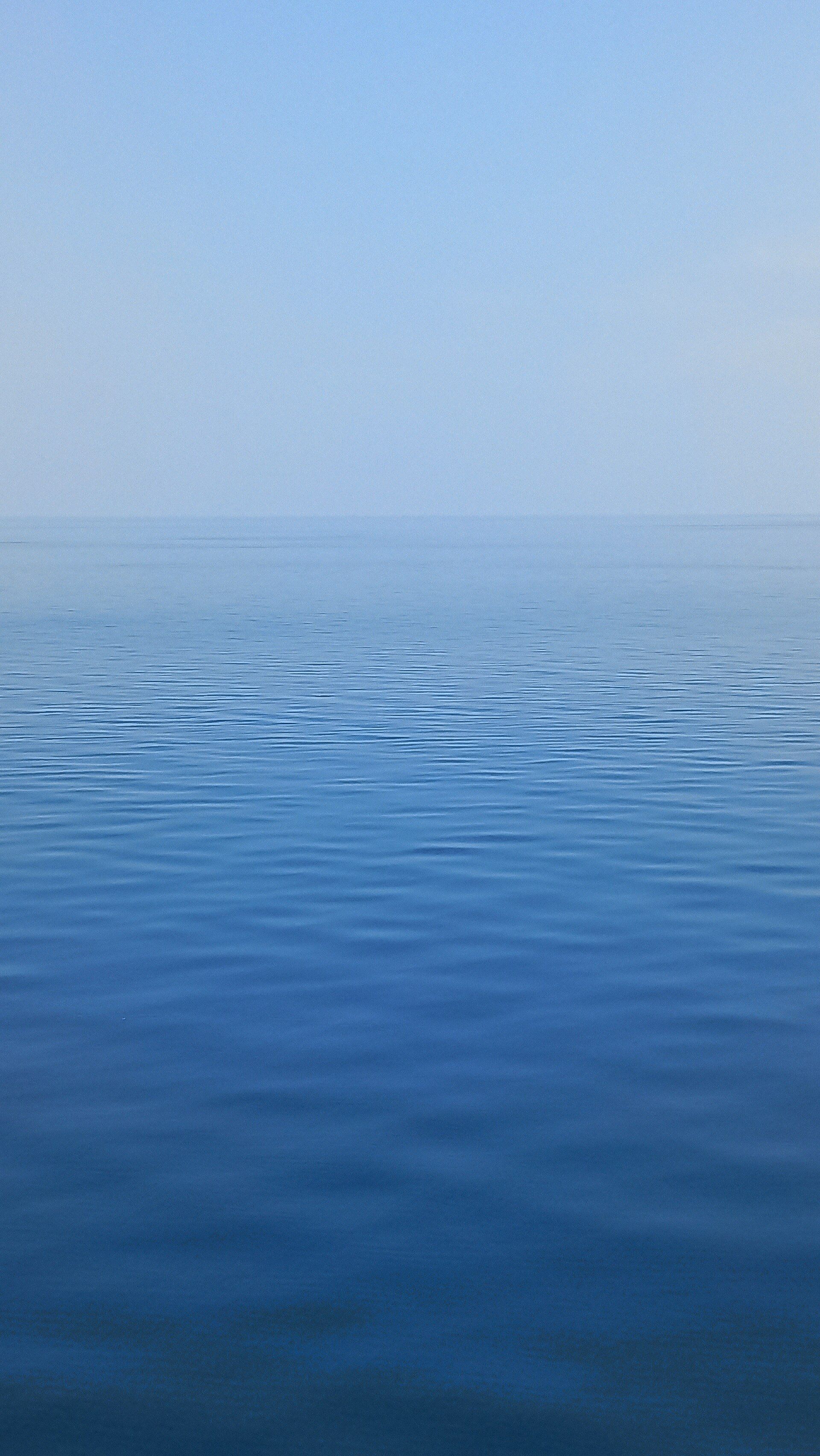 The horizon, finally still.